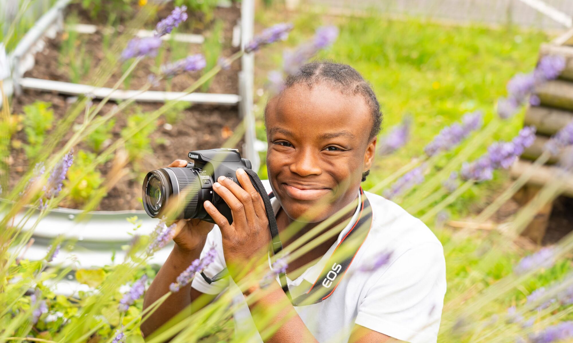 Pioneer house high school - student taking photos outdoors